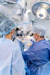 Operation in hospital. Health care concept. Surgeons`s team working. Selective focus. Medical room...