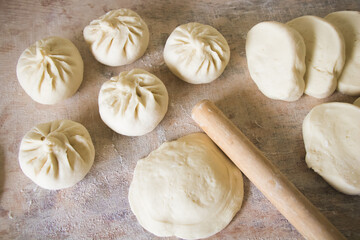 Image of making process of Chinese traditional food - baozi ( Chinese steamed buns )