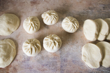 Image of making process of Chinese traditional food - baozi ( Chinese steamed buns )