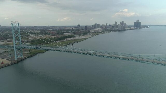 This video is about an aerial of the Ambassador Bridge over the Detroit river near downtown Detroit. This video was filmed in 4k for best image quality.