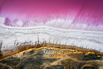 Abstract view of pink lake salt water from drone. Creative nature color concept. Top view background