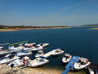 Fototapeta na wymiar boats in the port on the capitolio lake - minas gerais brazil