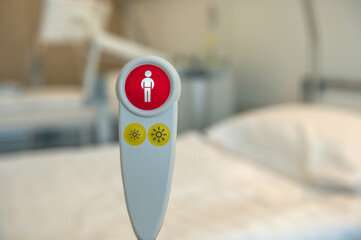 Nurse call button to call the nurse for help in the hospital. Concept: care and health
