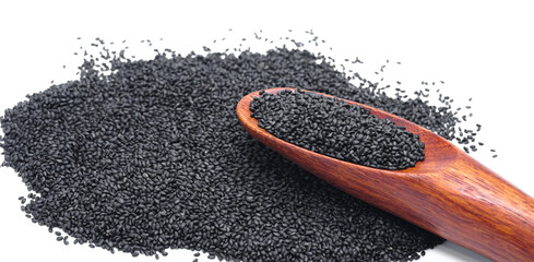 Fototapeta premium Basil seeds in wooden spoon on white background. 