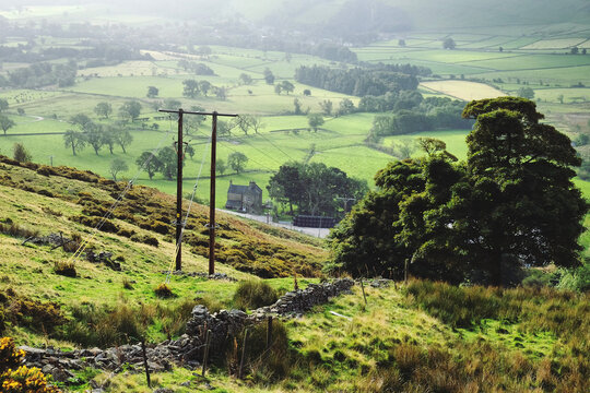 Electricity pylon and view  of the Hope Valley, Peak District, Derbyshire