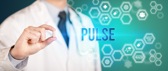 Close-up of a doctor giving you a pill with PULSE inscription, medical concept