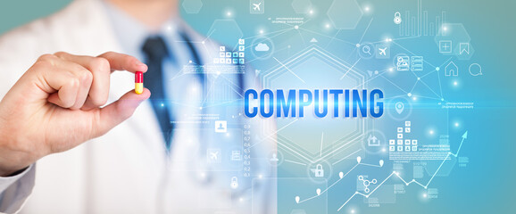 Doctor giving a pill with COMPUTING inscription, new technology solution concept