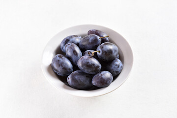Plums in bowl