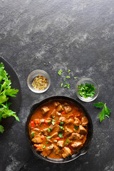 Cooked chicken livers in frying pan