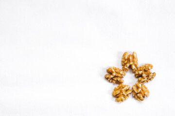 Minimalistic walnuts composition. Fall / winter holidays theme background. Empty space for text.