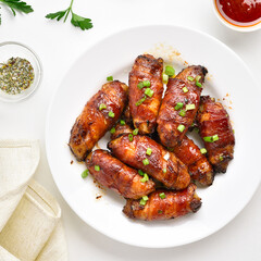 Bacon wrapped grilled chicken wings