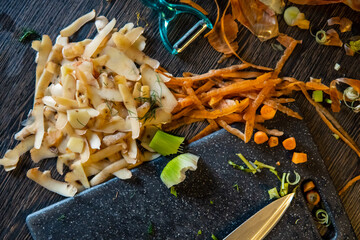 Organic cooking waste scraps: Vegetable and root veggie peels of potatoes, carrots, celery, onions,...