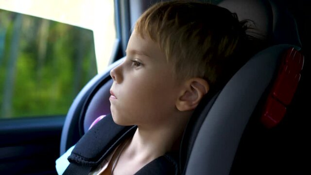 The child goes in a car seat in the car. Family trip