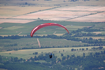 Paraglider flying from Dobrostan in Bulgaria	