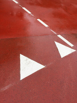 wet red asphalt road
