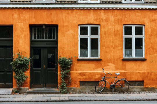 Bicycle against a colored wall in Copenhagen, Denmark