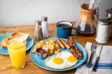 traditional american breakfast on wooden table