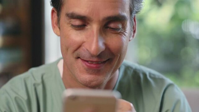 Close up shot of a doctor having a video call with a patient from his home office.