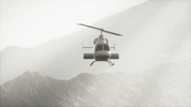 extreme slow motion flying helicopter near mountains with fog