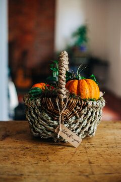 Autumn basket with pumpkin and a thank you note