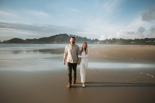 Couple Walking on Beach