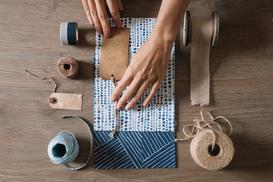 Woman Wrapping a Present