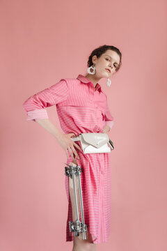 Slim woman with external fixation apparatus looking at camera