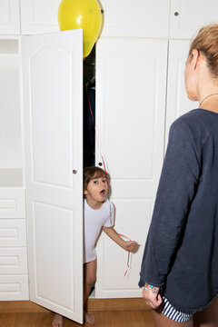 4 year old boy hidding in a closet