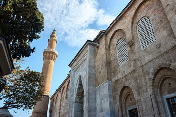 Fototapeta na wymiar Bursa Grand Mosque or Ulu Cami with blue cloudy sky. Ulucami is landmark from Ottoman Empire and the largest mosque in Bursa.