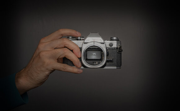 Old analog single lens reflex camera. Canon AE 1.