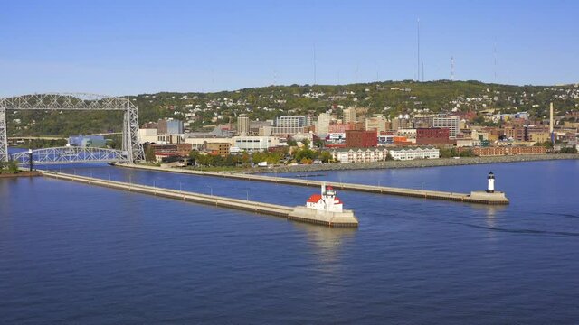 Aerial view of downtown Duluth, Minnesota from Lake Superior over lighthouses