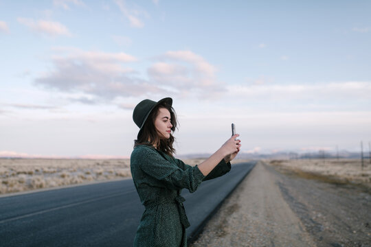 Girl traveler taking a photo