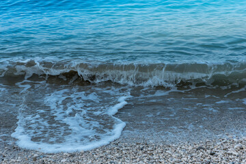 Sea waves on the pebble beach