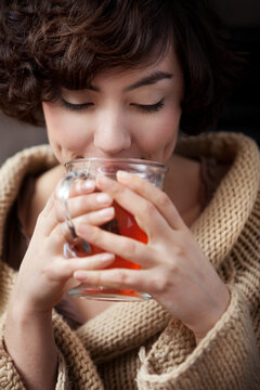 Woman Sipping Tea