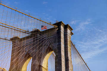 Fototapeta premium View of upward view with beautiful colors of Brooklyn Bridge, New York City