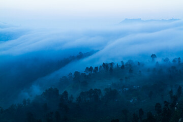 Fog waves in Ella gap between Ella rock & Little adam's peak in Sri Lanka