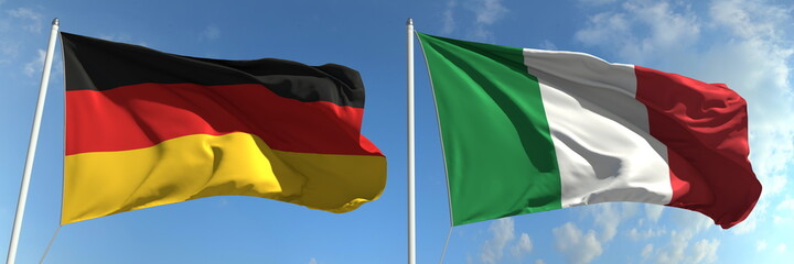 Waving flags of Germany and Italy on flagpoles, 3d rendering