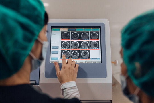 Biologists working with professional equipment in IVF laboratory