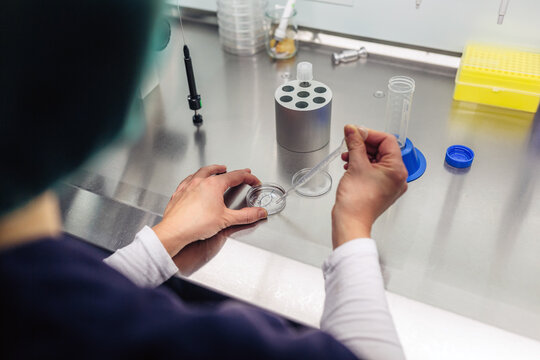 Closeup of biologist working with fluids