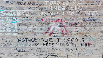 graffiti on wooden wall. texture. Santiago's walk.