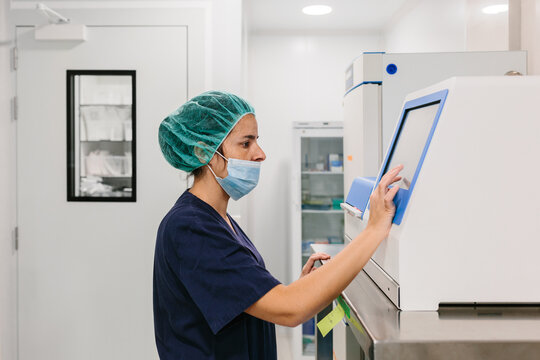 Biologist working on professional computer with touch screen