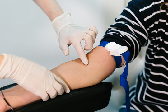 Macro shot of nurse performing a blood draw to a patient
