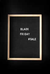 Text black friday sale on black letter board on black background