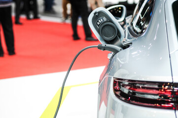 Fototapeta premium New energy Is electric power for cars Charging a new battery Future car transportation.