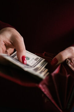 Female hands holding money