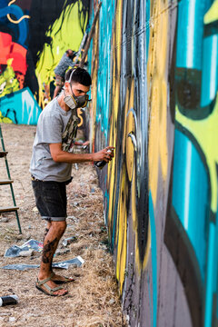 Graffiti artist painting