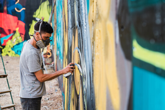 Graffiti artist painting