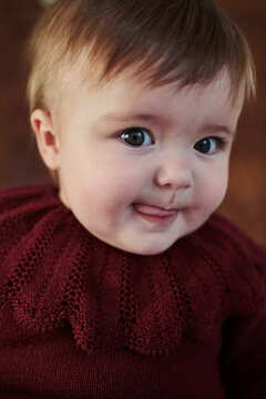 Portrait of cute baby in sweater