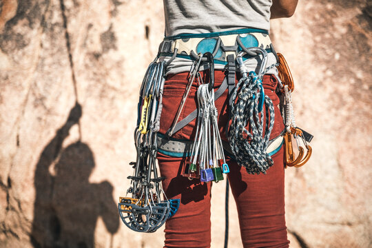 red trousers and climbing gear