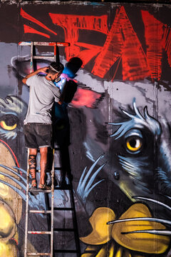 Graffiti artist painting